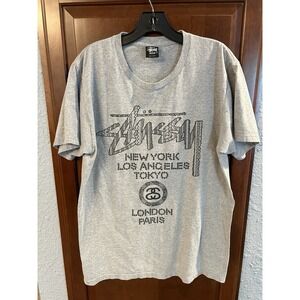 Stussy World Tour Gray T Shirt Medium Spell Out Logo NY LA Tokyo London Paris